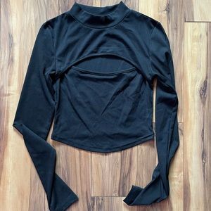 Black long sleeve shirt with cut out on the front
